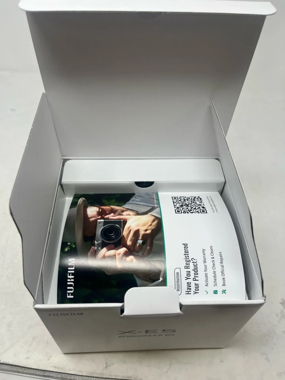 Fujifilm X-E5 with lens